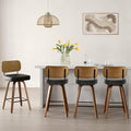 Bekrvio Swivel Counter Height Bar Stools Set of 4, Mid-Century Modern Upholstered Faux Leather Barstools with Wood Back, 26" Seat Height Bar Stools for Kitchen Island, Black Seat and Walnut Frame