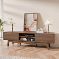 TOLEAD 59" Mid Century Modern TV Stand for TVs up to 65 Inch, Low Profile Entertainment Center with Fluted Sliding Doors & Storage, Wood TV Console Table for Living Room, Walnut